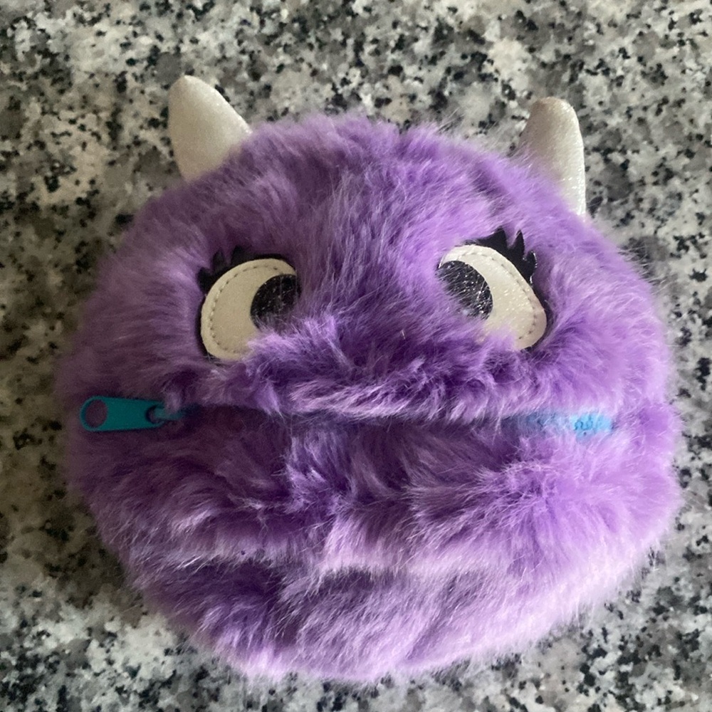 Furry mini monster pouch